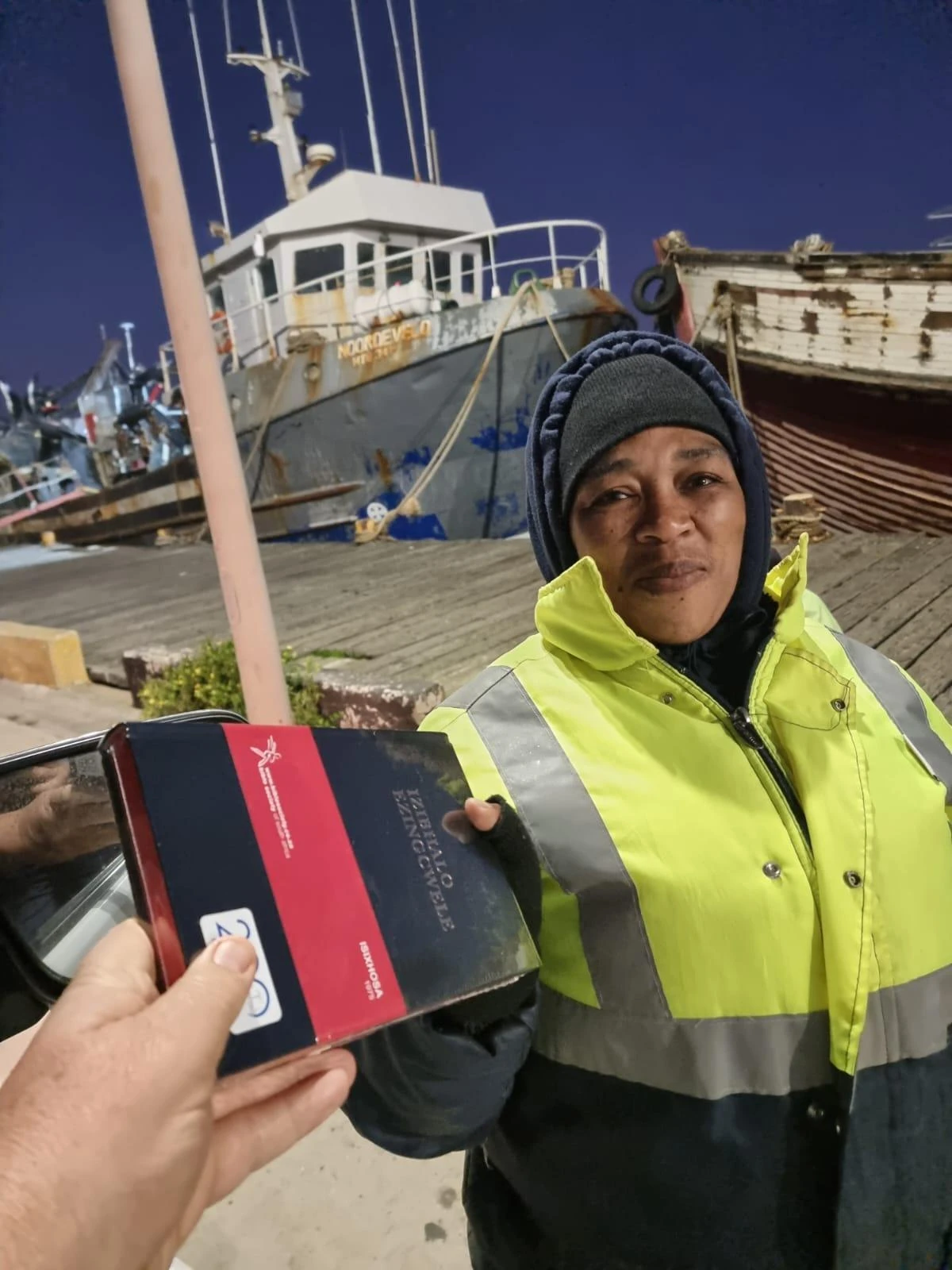 person receives Bible